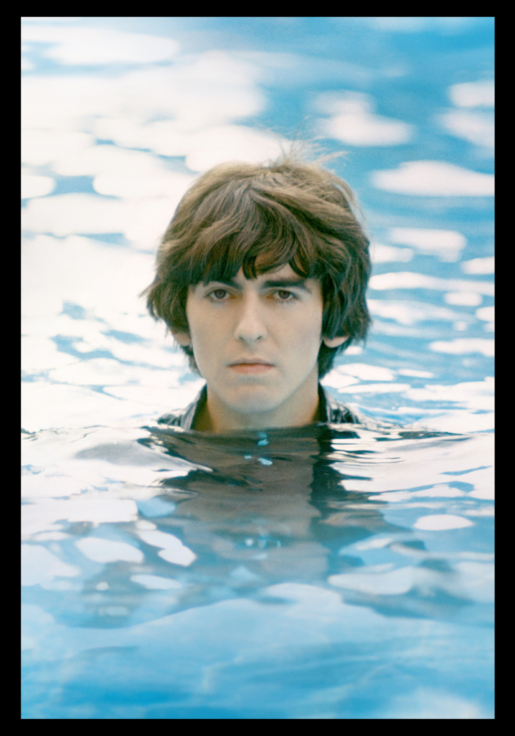 George harrison living in the material